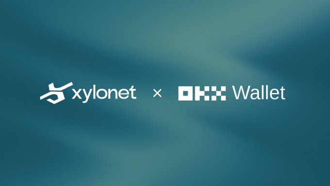 Minimalist blue gradient promotional image showing the logos 'xylonet × OKX Wallet' side by side, indicating a partnership or collaboration announcement.