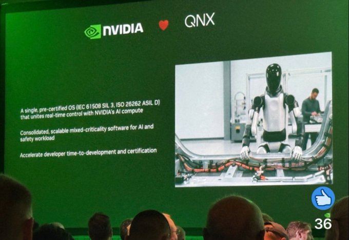 A presentation slide displays the NVIDIA and QNX logos (with a red heart between them) alongside an image of a humanoid robot, highlighting their partnership in providing a pre-certified OS (IEC 61508 SIL 3, ISO 26262 ASIL D) that unites real-time control with NVIDIA's AI compute for robotics applications. The slide emphasizes consolidated, scalable mixed-criticality software designed to accelerate developer time-to-development and certification for AI and safety workloads.