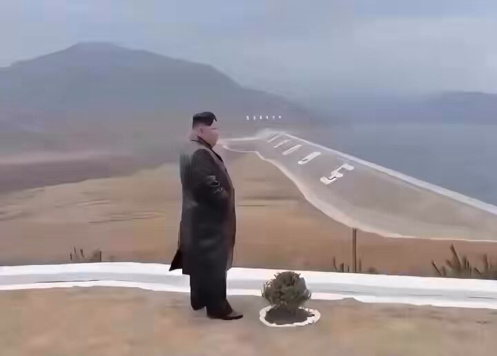 The image shows a man wearing a black coat standing next to a small green plant or bush. The background features mountains, suggesting that he might be near a scenic location like a mountain range or a beach. The post behind him says "That feeling when U know, One day all Ur $DOG bros will sell their bags & leave, And U will be the last $DOG holder standing till $DOG at $1". It seems to emphasize the importance of cherishing small moments and appreciating life in the face of uncertainty.