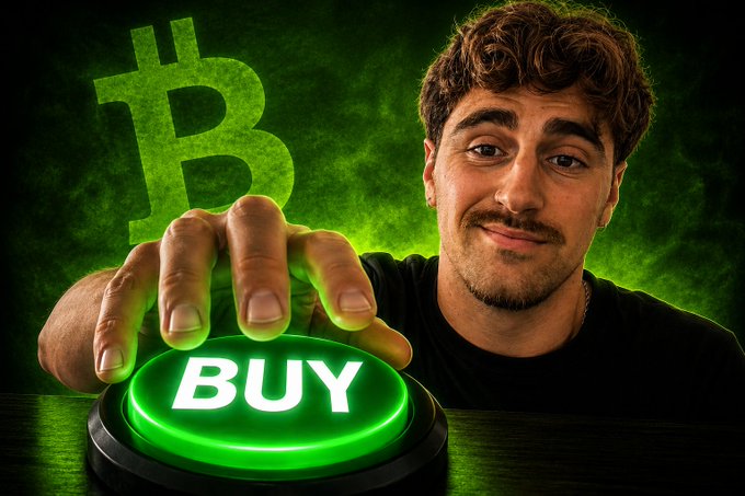 A young man smiles while reaching toward a glowing green "BUY" button with a Bitcoin symbol and logo displayed in the background.
