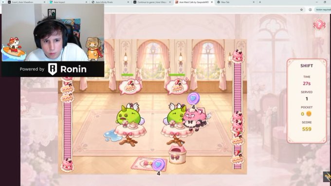 A livestream screenshot shows a gamer wearing headphones in a webcam feed labeled "Powered by Ronin," broadcasting gameplay of a cute pink character game with a "SHIFT" score panel showing 559 points.