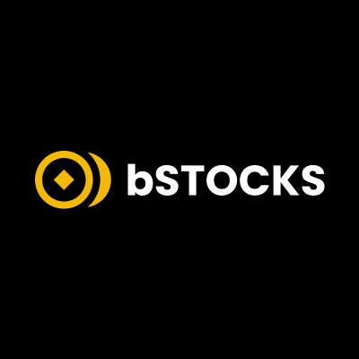The image shows a logo for "bSTOCKS" featuring a yellow circular icon with a diamond shape inside, positioned to the left of the bold white text on a black background. The logo appears to be branding for a stock meme content series, likely related to the Binance Smart Chain (BSC) stock meme roundup mentioned in the accompanying post about market cap analysis.