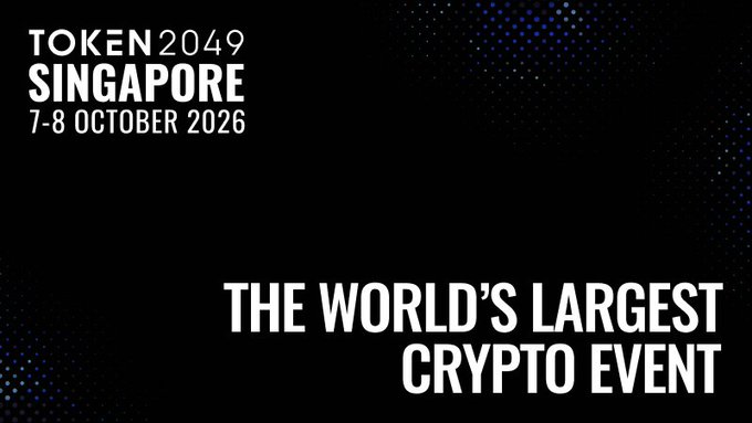 Promotional banner for 'TOKEN 2049 SINGAPORE 7-8 OCTOBER 2026' on a black background with blue dot accents, advertising 'THE WORLD'S LARGEST CRYPTO EVENT'.