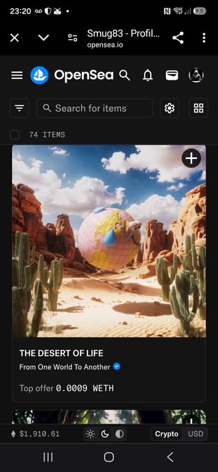 A mobile screenshot of the OpenSea NFT marketplace displaying a profile with the title 'Smug83' and a featured NFT titled 'THE DESERT OF LIFE From One World To Another' with a top offer of 0.0009 WETH.
