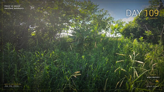 A photograph of a grassy field with trees displays overlay text including 'PROOF OF GRASS verified outdoors', 'DAY 109 IMMORTAL', 'JUL 09, 2026', and 'TOP 1% grass touchers'.