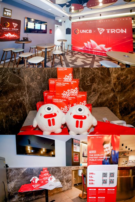 Three photos showing a UNCB x TRON branded event space with red decor, plush toy adapters stacked in red 'TRON TRAVEL ADAPTER' boxes, and a promotional banner for 'TRON: The World's Fastest-Growing Public Chain'.