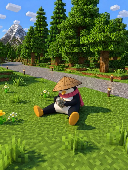 A Minecraft scene featuring a penguin character wearing a conical Asian-style hat and red scarf, sitting on grass holding an object, with trees, a pathway, and mountains in the background.
