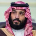 The image shows a man wearing a traditional red-and-white checkered keffiyeh (ghutra) headdress, appearing in what looks like a formal or official setting. He is likely a Saudi official or figure referenced in the post, which discusses Saudi Arabia withdrawing from the mBridge central bank digital currency (CBDC) project while Riyad Bank collaborates with Ripple on blockchain-based financial initiatives.