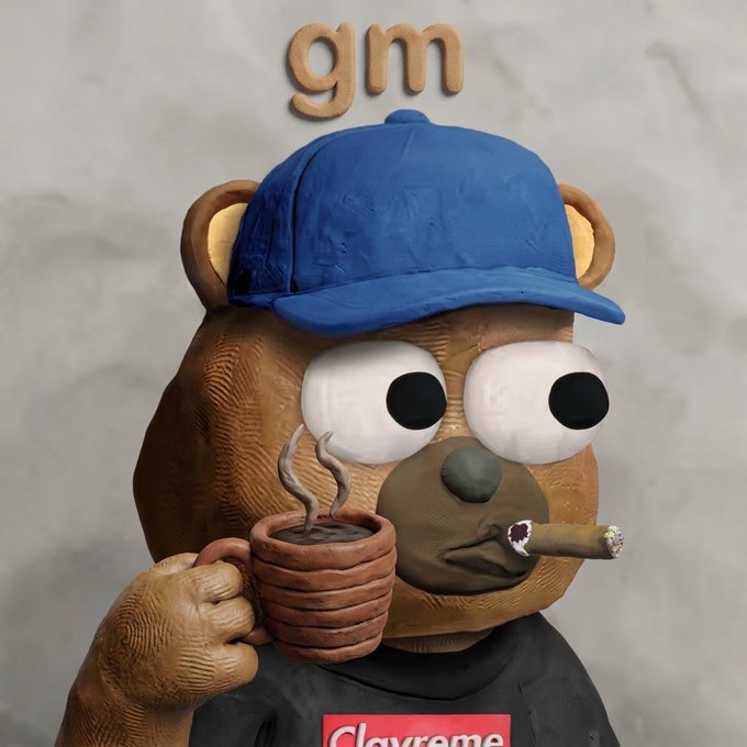 A 3D cartoon bear wearing a blue cap with 'gm' text above, holding a cup of coffee and smoking a cigar while wearing a Supreme shirt.