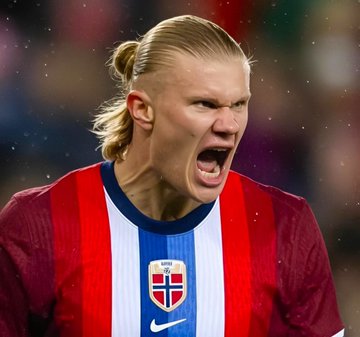 A blonde, ponytailed soccer player in a red and blue Norway national team jersey roars intensely in celebration or frustration, directly tying to news of a massive $1.2 million bet placed against Norway winning their match against England on Polymarket.