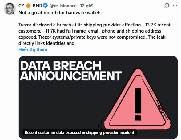 A tweet from CZ (Changpeng Zhao) @cz_binance discussing a Trezor hardware wallet data breach, stating 'Not a great month for hardware wallets' and noting that ~13.7K customers had their shipping information exposed, accompanied by a 'DATA BREACH ANNOUNCEMENT' graphic with a red warning triangle.