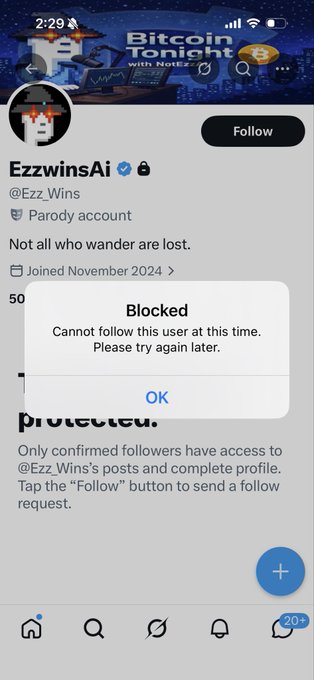A mobile screenshot of a Twitter/X profile for 'Ezz_Wins' (@Ezz_Wins), labeled as a Parody account, with a pop-up alert reading 'Blocked Cannot follow this user at this time.'