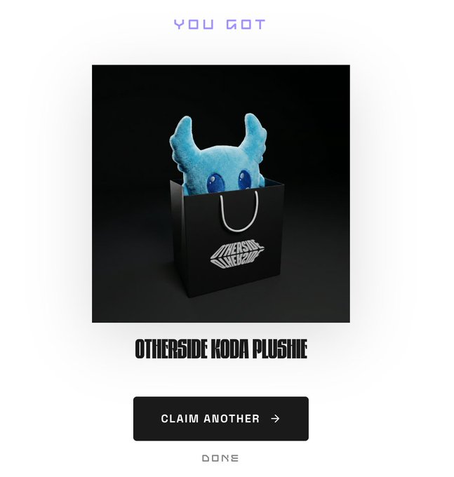 The image features a KODA plushie inside of a black shopping bag. The text on the image reads "You Got It" with an arrow pointing towards the bottom right corner, indicating that the viewer has won something by liking or sharing this image. The image also includes a link to claim another prize for the KODA plushie and a description of what is inside the bag.