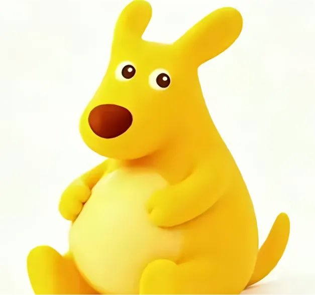 A yellow 3D rendered cartoon character resembling a dog or kangaroo with large round eyes and a brown nose sits against a plain white background.
