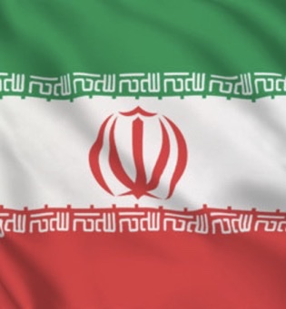 The image shows the flag of Iran, with its distinctive green, white, and red horizontal stripes and the red emblem in the center. The post calls for an end to war, using the Iran flag as a symbol of the conflict, while pivoting to express hope for cryptocurrency markets—particularly XRP—to surge to new all-time highs.