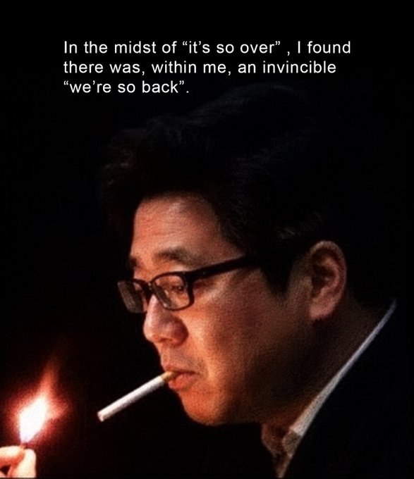 The image features an older man wearing glasses holding a lit cigarette and smoking it while looking down at his phone. The caption of the image reads "In the midst of it's so over... I found there was within me, an invincable 'we're so back'..." which is related to Tom Lee's Bitmine investment.