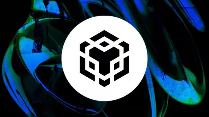A white circular logo with a black geometric cube design centered on a background of swirling iridescent blue and green fluid.