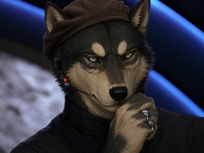 A detailed anthropomorphic wolf character wearing a brown beret, round wire-rimmed glasses, and a headset microphone strikes a thoughtful pose with its hand near its chin, displaying a silver ring. The wolf's piercing green eyes and contemplative expression perfectly embody the confident, patient "they'll all be barking soon enough" sentiment in the post about $WOOF.