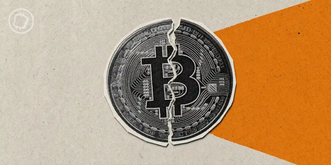 A stylized image of a Bitcoin logo that is cracked down the middle, split between a gray background and an orange background.