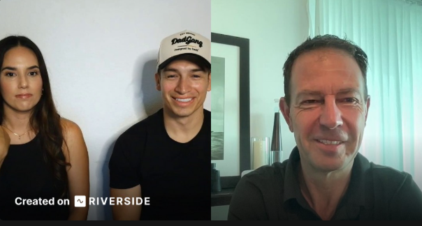 A video screenshot shows three people in separate panels, created with Riverside software. A woman with long dark hair is on the left, a smiling man in a black shirt and 'DaeBang' cap is in the middle, and a smiling man in a dark shirt is on the right.