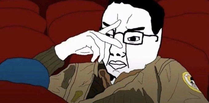 A Wojak-style cartoon meme depicting a character in military camouflage adjusting his glasses with an unamused expression, seated on red cinema-style seats.