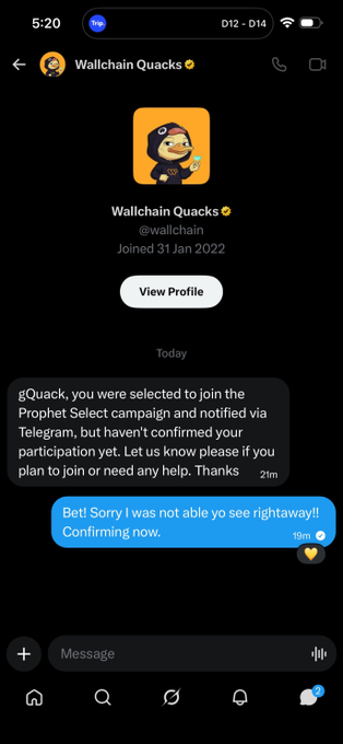 The main focus of the image appears to be a screenshot of a chat window that features an account from Wallchain Quacks with their messages displayed. One of these messages, which stands out due to its orange hue, indicates that the user has been selected for a campaign on Prophet AI by using telegram. In this particular message, a user thanks another user for joining and mentions that it's important to note if anyone was left behind. The overall context suggests an online social interaction where people communicate via text messages or instant messaging apps like WhatsApp.