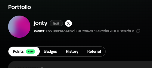 A digital portfolio profile page for user 'jonty' displaying a wallet address '0x9B803A6AB2d551F79a62E1Fe9cd8E6DDF3e87bC1' and tabs for Points, Badges, History, and Referral.