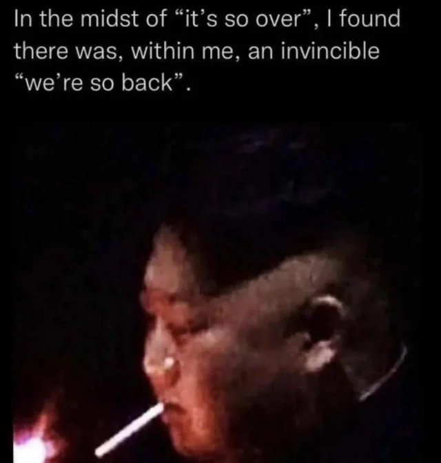 A meme image featuring a low-light photo of a young man smoking a cigarette, overlaid with text: 'In the midst of "it's so over", I found there was, within me, an invincible "we're so back".'