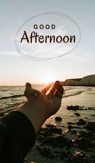 A hand reaching toward a sunset over the ocean with text 'GOOD Afternoon' in an oval frame at the top.
