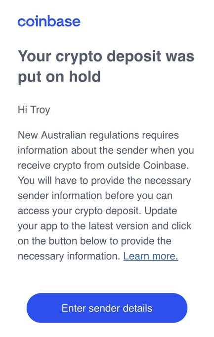 A Coinbase email notification titled "Your crypto deposit was put on hold," addressed to Troy, informing him that new Australian regulations require sender information for crypto received from outside Coinbase, with a blue "Enter sender details" button. The notification illustrates the impractical compliance burden Troy is referencing—Australia's stringent Know Your Customer (KYC) requirements for crypto transactions, prompting him to remove crypto address donation options from Have I Been Pwned in favor of PayPal.
