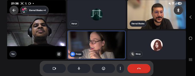 A Google Meet video call in progress at 21:36 with five participants visible: "You," "Eternal Blades +4," "Harun," "Dougie," "Nicoy," and an unnamed attendee, showing the virtual meeting with the Eternal Blades team referenced in the post. The interface displays standard call controls including microphone, camera, and a red end-call button at the bottom.