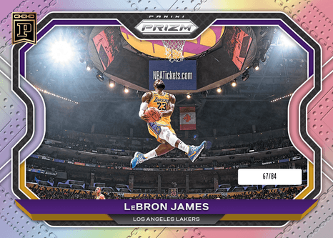 A Panini Prizm basketball trading card numbered 67/84 featuring LeBron James of the Los Angeles Lakers going up for a dunk.