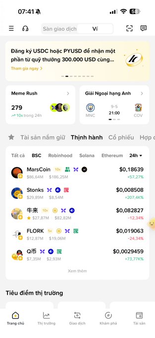 A Vietnamese cryptocurrency exchange app screenshot showing a market list with 'Meme Rush', 'Giải Ngoại hạng Anh', and tokens like MarsCoin, Stonks, 牛未, FLORK, and ƆffĮ.