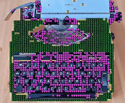 The image features a typewriter with pink hearts scattered across its keys, creating an artistic and whimsical design. The typewriter has been repurposed as a unique piece of art, with each key representing a heart. The text "you" is written on the keyboard in black letters, while the rest of the keys are adorned with hearts. The post includes a link to a website called @0xfilthy, which might be related to the typewriter's transformation into an artistic installation or a creative project.