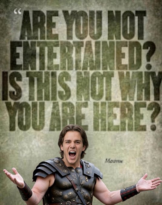 A poster-like image shows a shouting armored man with his arms spread beneath the large text “ARE YOU NOT ENTERTAINED? IS THIS NOT WHY YOU ARE HERE?”