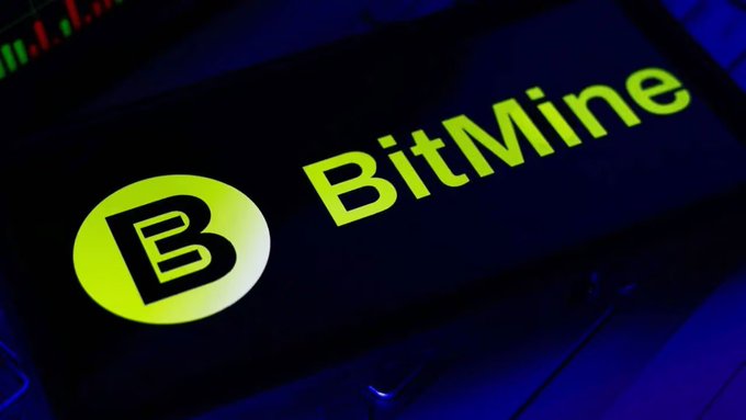 A glowing screen displays the BitMine logo, featuring a stylized 'B' in a yellow circle next to the green text "BitMine".
