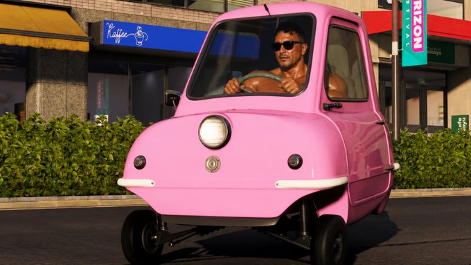 The image shows a man driving a pink car down a street, with a building visible behind him. The caption of the image reads "This is how @el33th4xor will show up to the next AVAX summit: $HOTEMIN $AVAX". This means that the person in the pink car is likely attending an event related to automotive technology or the automotive industry, possibly at a conference or exhibition. The caption also mentions the use of the hashtag #el33th4xor on social media platforms and the presence of a building behind the man driving the car.