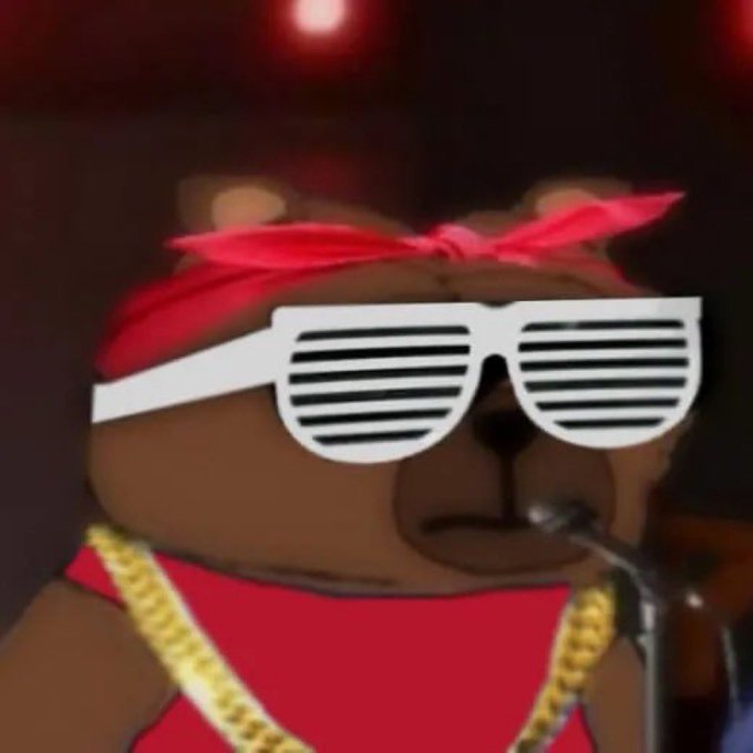 The image features a cartoon bear wearing red clothing, sunglasses, and a bandana with a red bow tie. The bear appears to be singing into a microphone while wearing these accessories. The caption of the image reads "Day 691 posting a meme until $BOBO gets to 1B market cap". This suggests that the post is related to a popular meme or trend involving the cartoon bear and its outfit, possibly referencing a specific event or situation in which the bear's appearance was significant.

The image also contains some text elements such as "Day" and "691", which might be part of the caption or related to the context of the post. The overall theme of the image seems to revolve around humor, entertainment, and lightheartedness, with a focus on the cartoon bear's unique appearance and style.