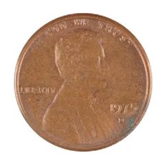 A close-up of a 1994 Lincoln penny with 'IN GOD WE TRUST' and 'LIBERTY' visible on the worn copper surface.