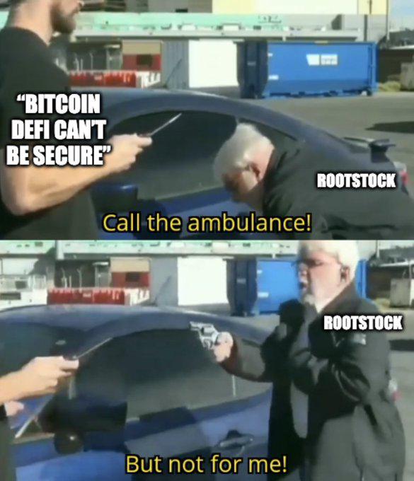 The image is a two-panel meme featuring a confrontation in a parking lot where an attacker labeled "BITCOIN DEFI CANT BE SECURE" is disarmed by a bearded man labeled "ROOTSTOCK" who yells "Call the ambulance! But not for me!" while pointing a gun back at the attacker. This humorously illustrates how Rootstock, which inherits Bitcoin's security through merge-mining, can withstand attacks since attacking it would require compromising over 84% of Bitcoin's hashrate.