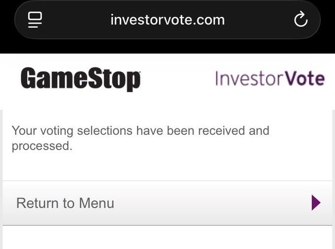 The image shows a cellphone screen with a message from GameStop, an online marketplace for video games. The message displays the website's name and logo along with a reminder about the importance of voting.