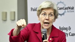 Senator Elizabeth Warren speaks at a CareCantWait Action event promoting paid family and medical leave policies, unrelated to the post about Mizuho's $86 billion impact on the Clarity Act.