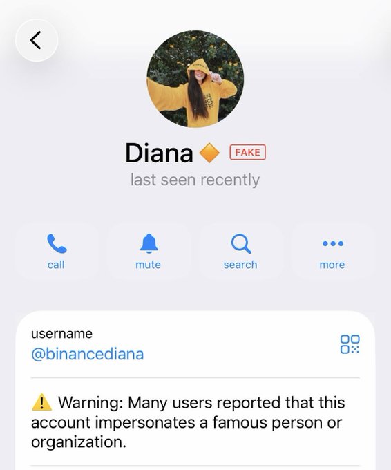 The image shows a Telegram profile for "Diana" (@binancediana) marked with a red "FAKE" badge and a warning that the account impersonates a famous person or organization, directly illustrating the user's complaint about their genuine Telegram account being incorrectly flagged as fake. The profile displays standard messaging options (call, mute, search, more) beneath the user's profile picture.