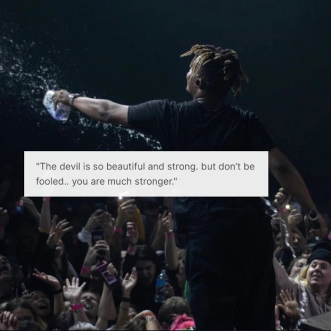 A performer in a black shirt pours water over the crowd at a concert, overlaid with the motivational quote: "The devil is so beautiful and strong. but don't be fooled.. you are much stronger." The image's empowering message pairs with the post's encouraging tone to greet followers with resilience for the day ahead.