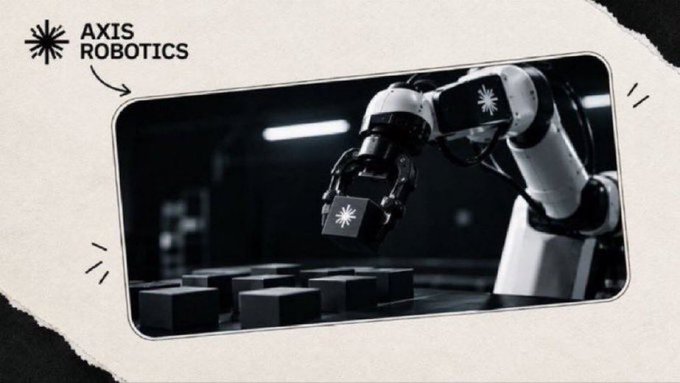 A black-and-white photograph of a robotic arm handling a cube marked with the 'AXIS ROBOTICS' logo, displayed in a stylized frame with the 'AXIS ROBOTICS' branding in the upper-left corner.