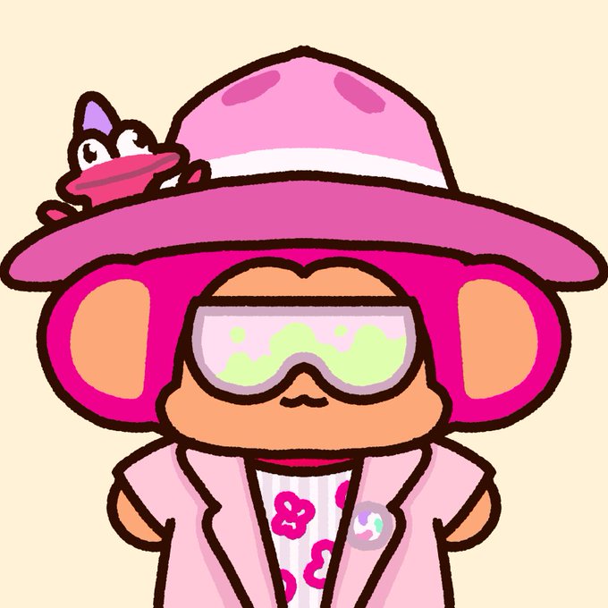 A cartoon illustration of a brown bear character wearing a pink hat, pink jacket, and green ski goggles, with a small frog sitting on its hat.