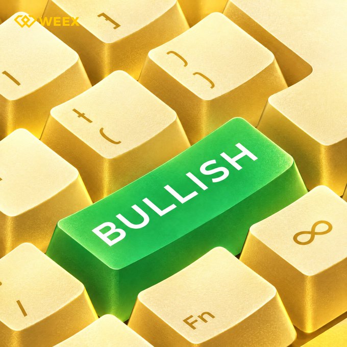 A golden keyboard features a standout green key labeled "BULLISH" amidst standard yellow keys, visually reinforcing the post's optimistic question "What are you bullish on?" by symbolizing a decisive, bullish outlook in financial markets. The WEEX logo appears in the top-left corner.
