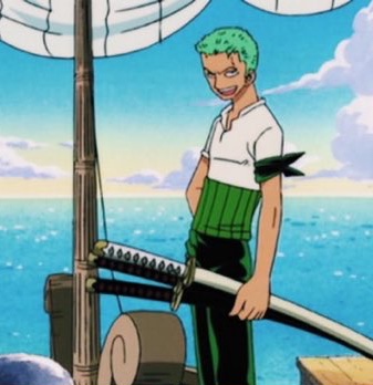An anime screenshot of the character Roronoa Zoro with green hair, wearing a white shirt and green pants with swords at his hip, standing on a boat.