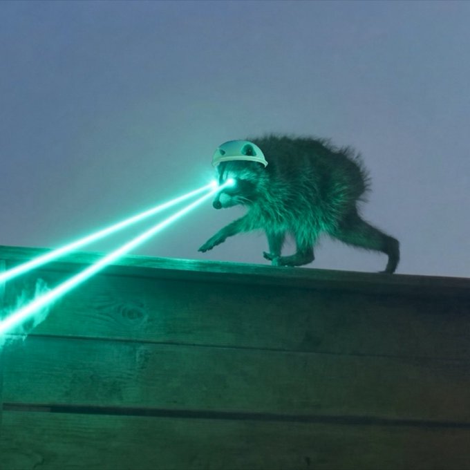 A raccoon wearing a small helmet, appearing to shoot green laser beams from its eyes while standing on a wooden beam at night.