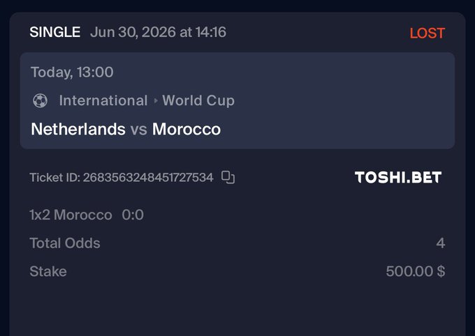 A TOSHI.BET betting slip showing a lost $500 wager on Netherlands vs Morocco (World Cup), with a Morocco 0:0 handicap bet at 4x total odds and ticket ID 2683563248451727534. The image illustrates the user's mention of losing $500 today, which they cite as motivation to give away $1000 worth of ANSEM tokens at 1k likes to recover before tomorrow's match.